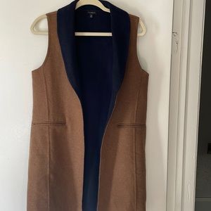 Gently used vest ! Rich indigo n camel/tan colored vest!
